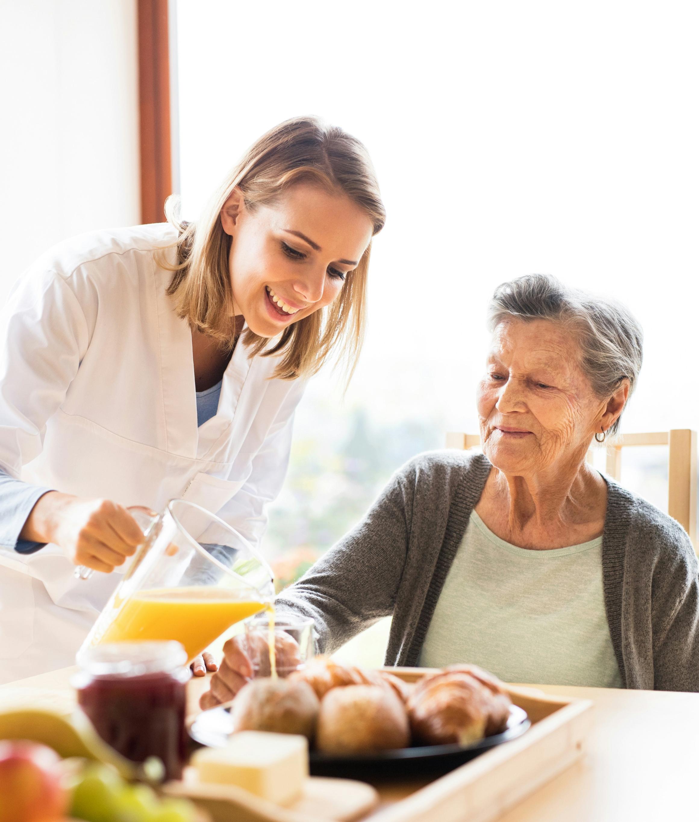 Healthcare professional speaking with a client